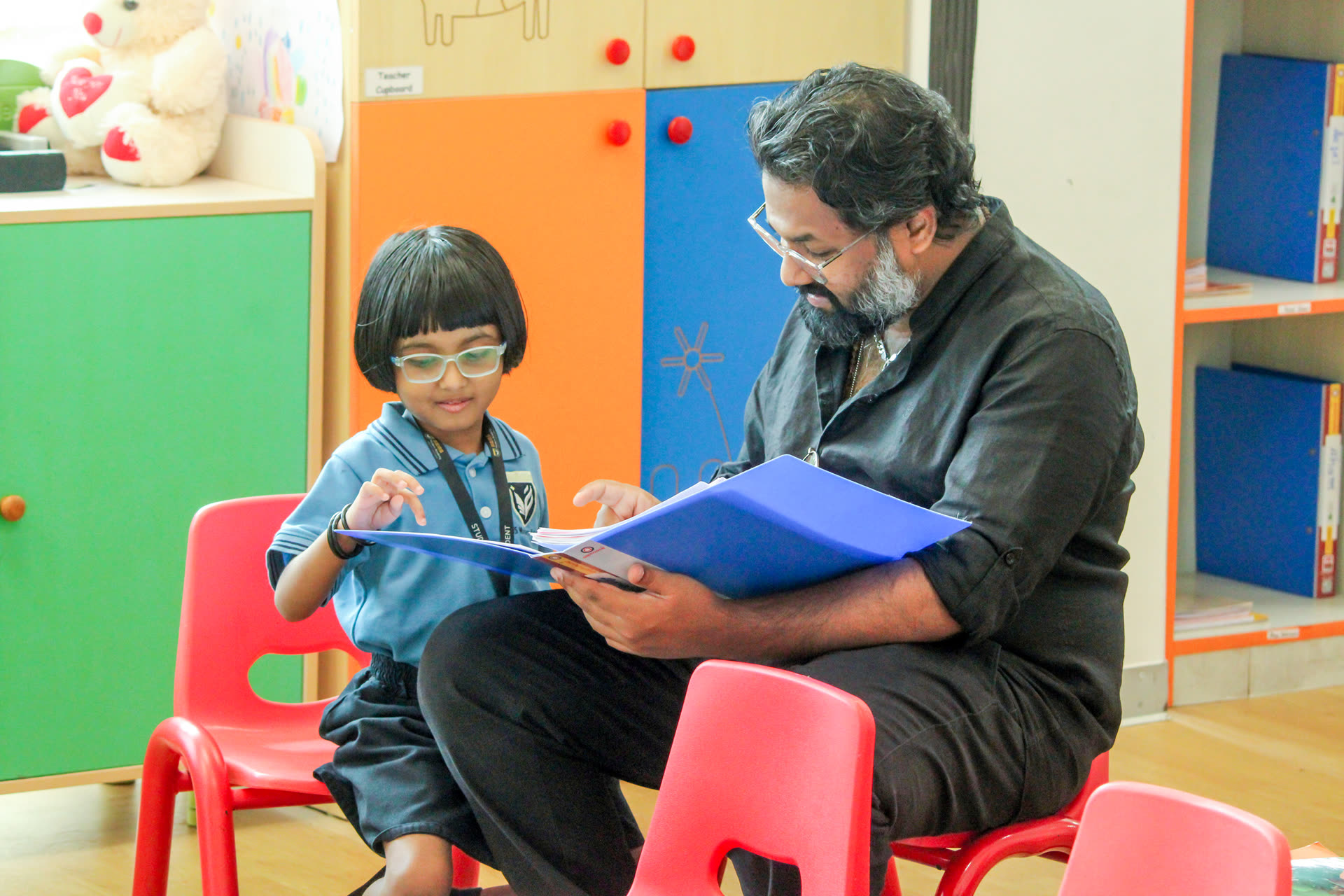 A GEMS teacher and learner together